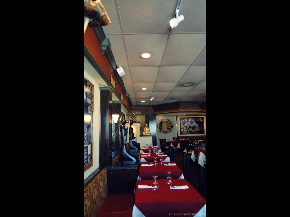 Dinning area with Buddha statue in back